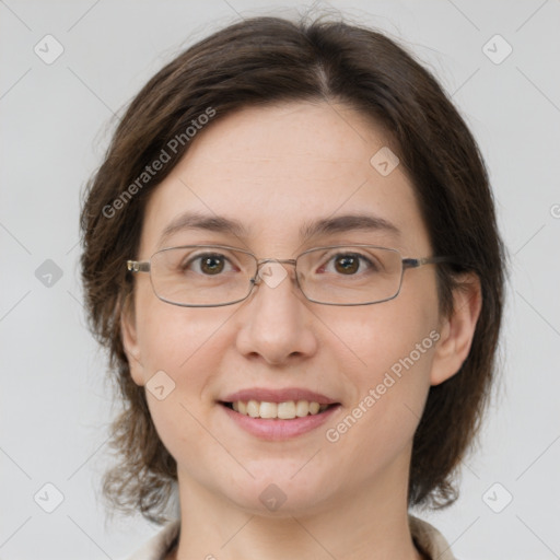 Joyful white adult female with medium  brown hair and brown eyes