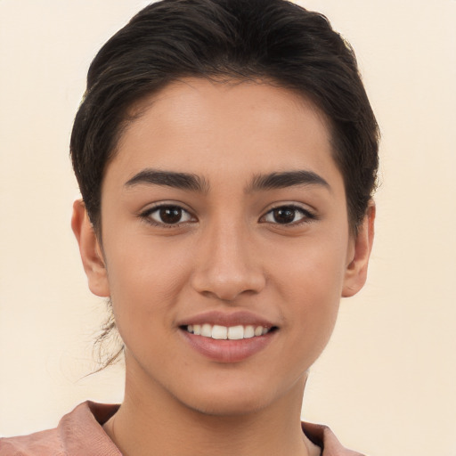 Joyful white young-adult female with short  brown hair and brown eyes