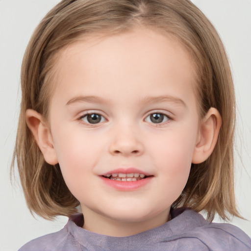 Joyful white child female with medium  brown hair and grey eyes