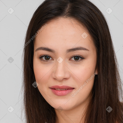 Joyful asian young-adult female with long  brown hair and brown eyes