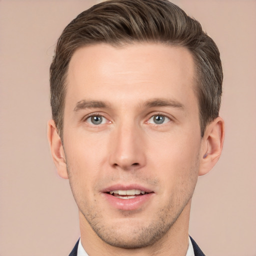 Joyful white young-adult male with short  brown hair and brown eyes