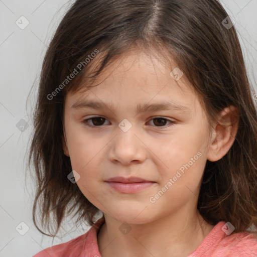 Joyful white child female with medium  brown hair and brown eyes