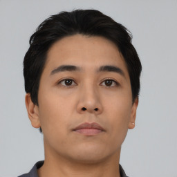 Neutral asian young-adult male with short  black hair and brown eyes