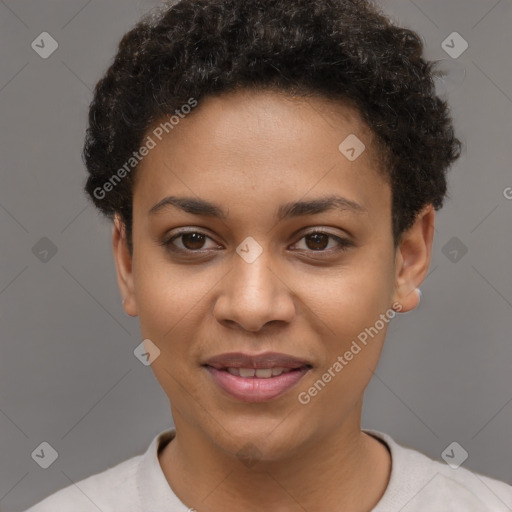 Joyful black young-adult female with short  brown hair and brown eyes