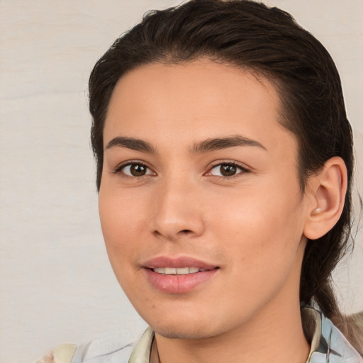 Joyful white young-adult female with medium  brown hair and brown eyes