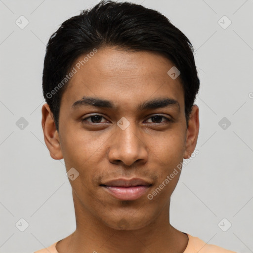 Joyful latino young-adult male with short  black hair and brown eyes