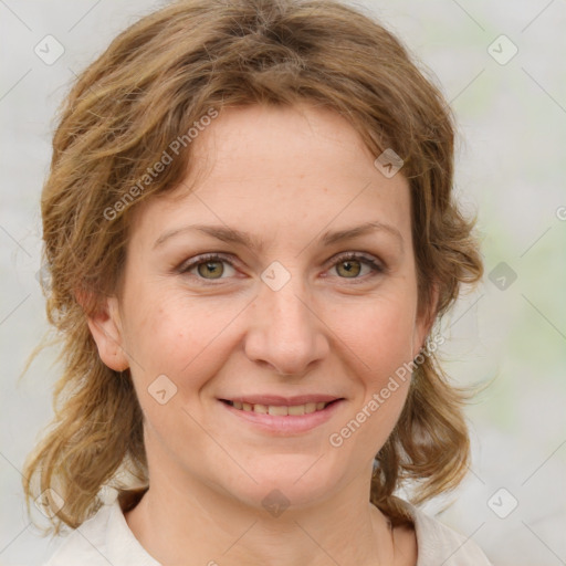 Joyful white young-adult female with medium  brown hair and green eyes