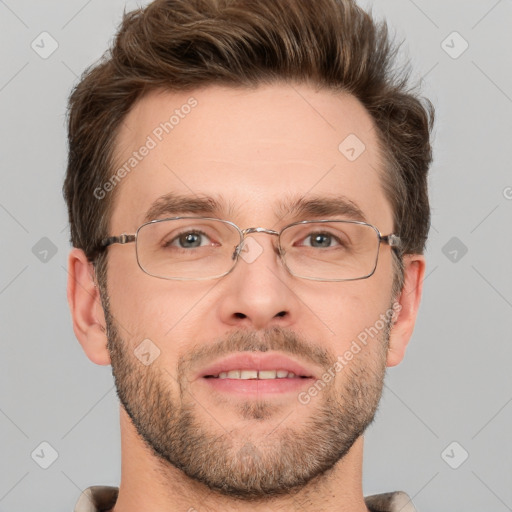 Joyful white adult male with short  brown hair and grey eyes