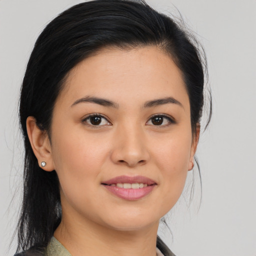 Joyful asian young-adult female with medium  brown hair and brown eyes