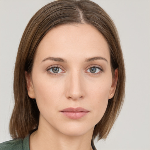 Neutral white young-adult female with medium  brown hair and grey eyes