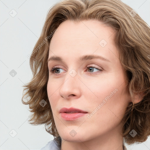 Neutral white young-adult female with medium  brown hair and blue eyes