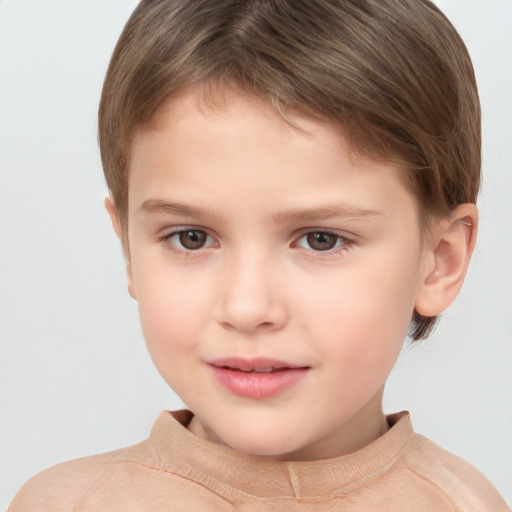 Joyful white child female with short  brown hair and brown eyes