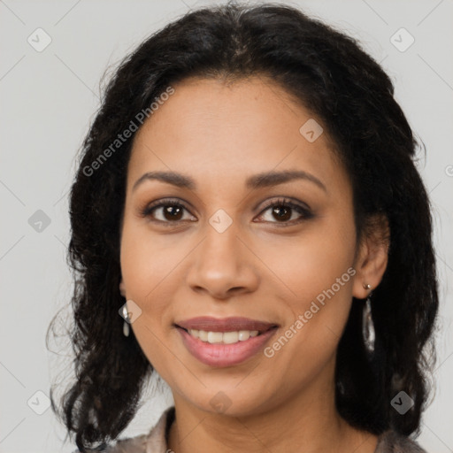 Joyful latino young-adult female with long  brown hair and brown eyes