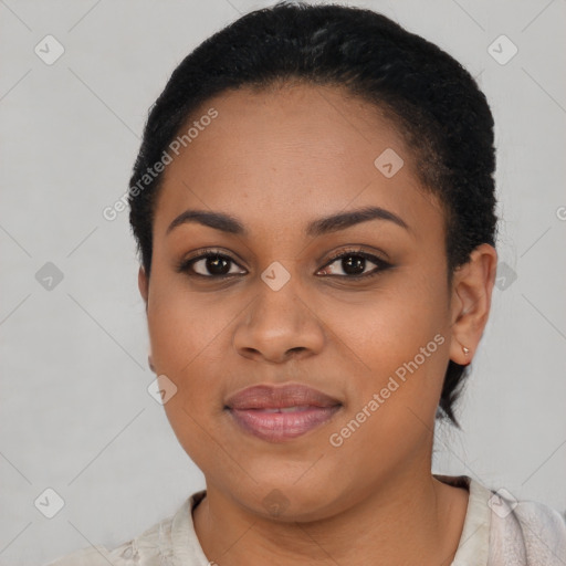 Joyful latino young-adult female with short  black hair and brown eyes