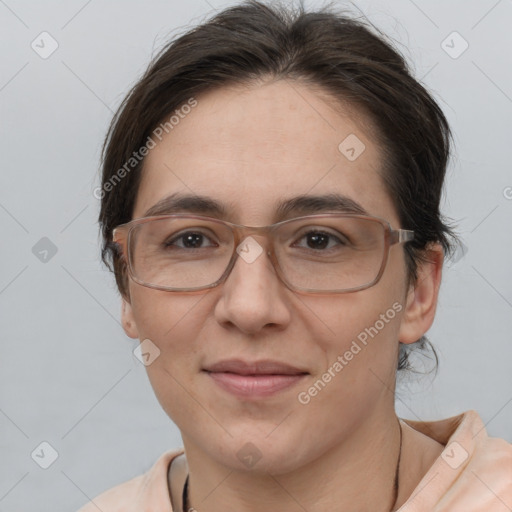 Joyful white adult female with medium  brown hair and brown eyes