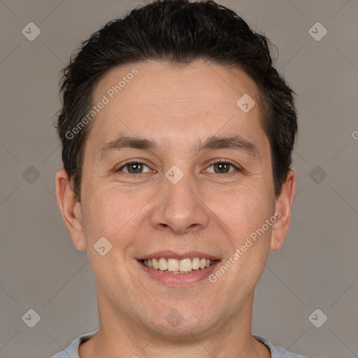 Joyful white adult male with short  brown hair and brown eyes