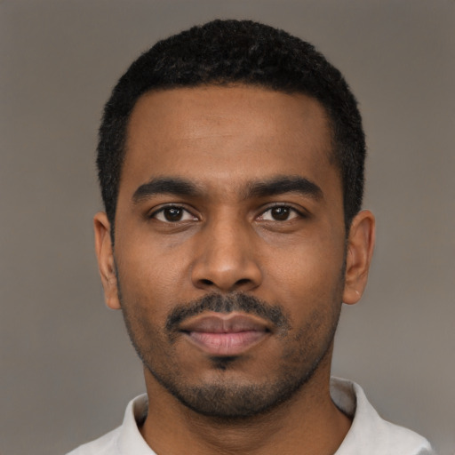 Neutral black young-adult male with short  black hair and brown eyes