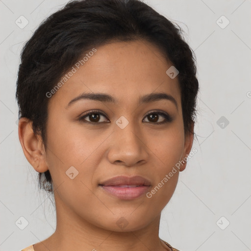 Joyful latino young-adult female with short  brown hair and brown eyes