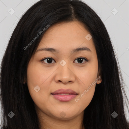 Joyful asian young-adult female with long  brown hair and brown eyes