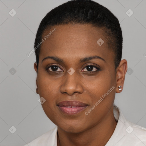 Joyful black young-adult female with short  black hair and brown eyes