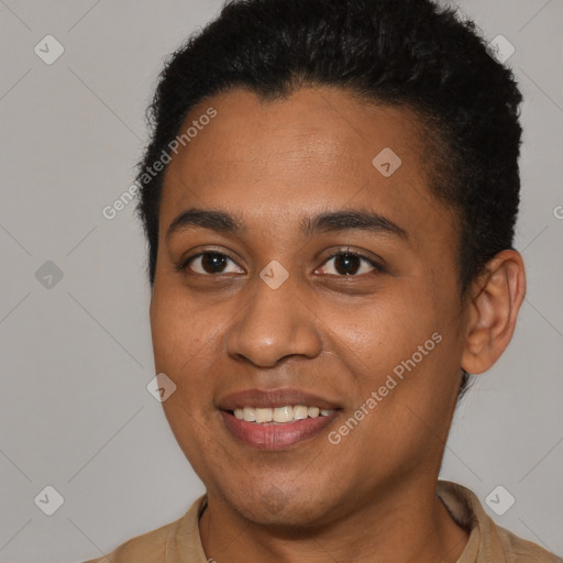 Joyful black young-adult female with short  brown hair and brown eyes