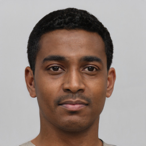 Neutral black young-adult male with short  black hair and brown eyes