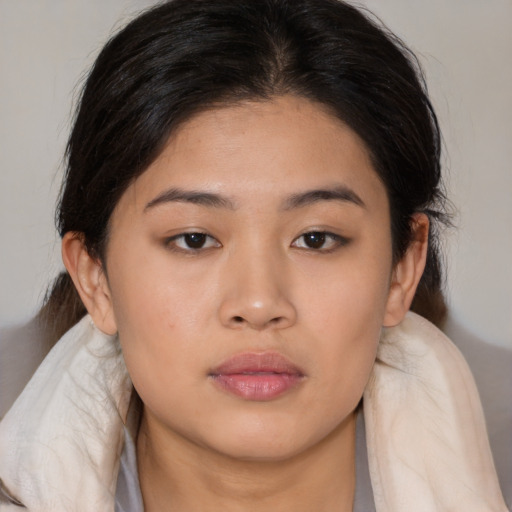 Neutral asian young-adult female with medium  brown hair and brown eyes