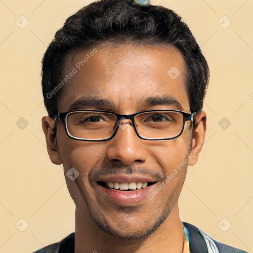 Joyful white young-adult male with short  black hair and brown eyes