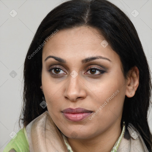 Joyful latino young-adult female with long  brown hair and brown eyes