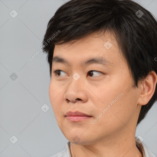 Neutral asian young-adult male with short  black hair and brown eyes