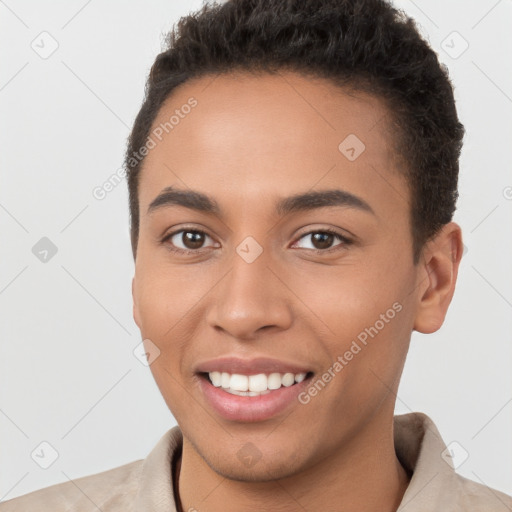 Joyful white young-adult female with short  brown hair and brown eyes