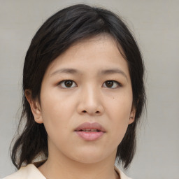 Neutral asian young-adult female with medium  brown hair and brown eyes