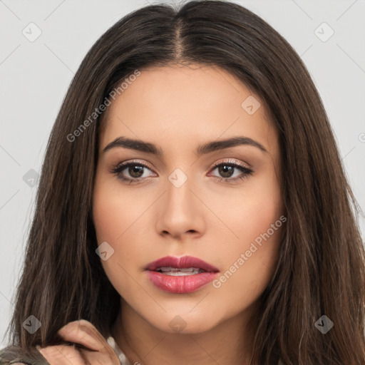 Neutral white young-adult female with long  brown hair and brown eyes