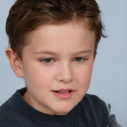 Joyful white child female with short  brown hair and brown eyes