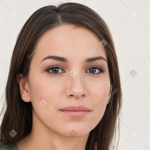 Neutral white young-adult female with long  brown hair and brown eyes