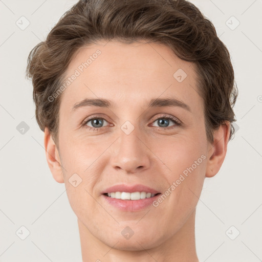 Joyful white young-adult female with short  brown hair and grey eyes