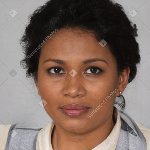 Joyful black adult female with short  brown hair and brown eyes