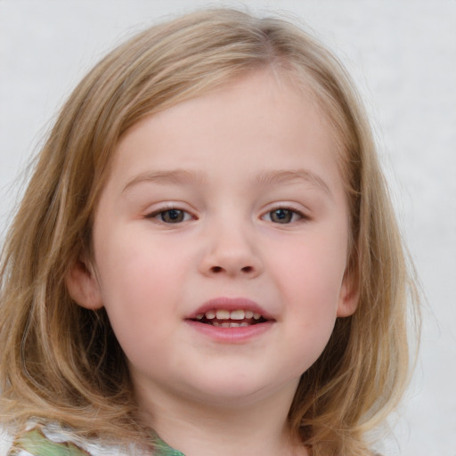 Joyful white child female with medium  brown hair and blue eyes