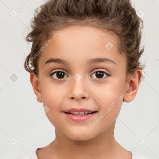 Joyful white child female with short  brown hair and brown eyes