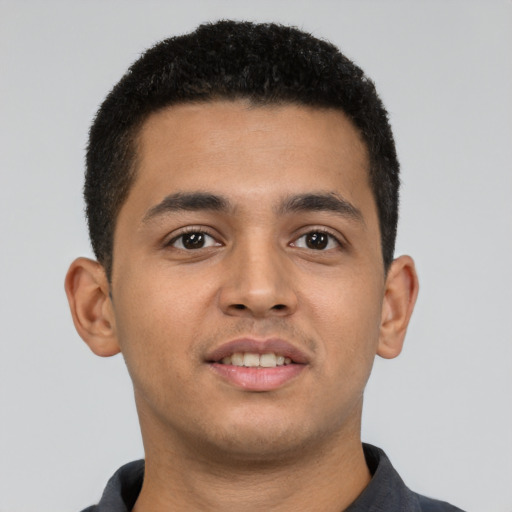 Neutral latino young-adult male with short  brown hair and brown eyes