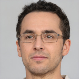 Neutral white adult male with short  brown hair and brown eyes