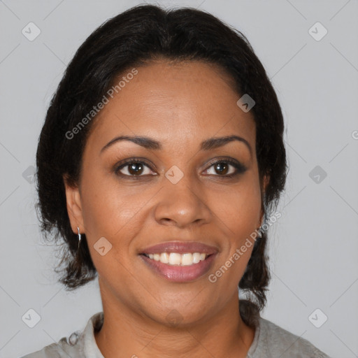 Joyful black young-adult female with medium  brown hair and brown eyes