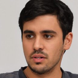 Neutral white young-adult male with short  black hair and brown eyes