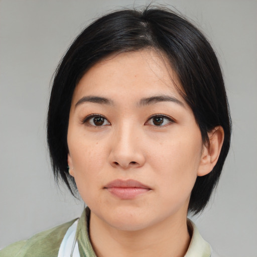 Neutral white young-adult female with medium  black hair and brown eyes