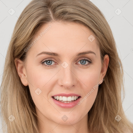 Joyful white young-adult female with long  brown hair and blue eyes