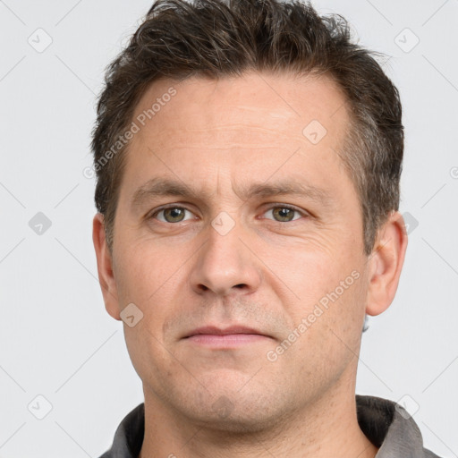 Neutral white adult male with short  brown hair and brown eyes