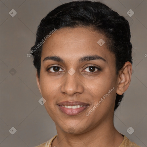 Joyful latino young-adult female with short  black hair and brown eyes