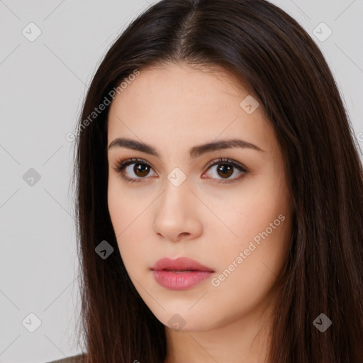 Neutral white young-adult female with long  brown hair and brown eyes