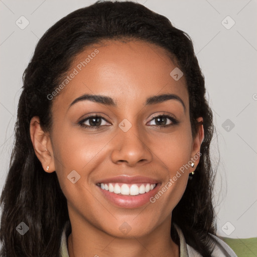 Joyful latino young-adult female with long  brown hair and brown eyes