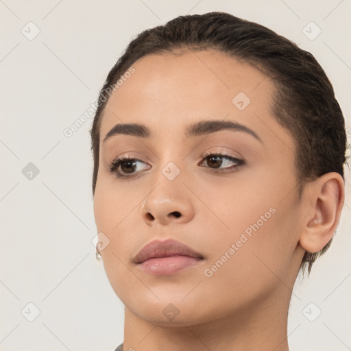 Neutral white young-adult female with short  brown hair and brown eyes